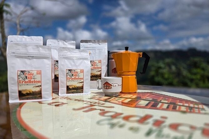 Bags of estate coffee and a stovetop moka pot on a farm table